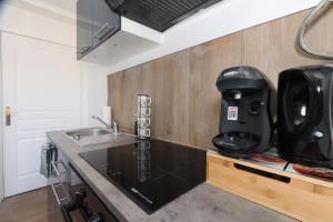 Appartements Coeur de ville, T2 cosy & elegant : photos des chambres