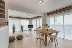 Gelijkvloers zeedijk appartement - lichtrijk en modern