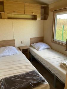 Campings Mobilhome Coup de Coeur : photos des chambres