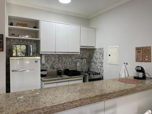 Riviera Flat 120 - Com serviços de hotelaria