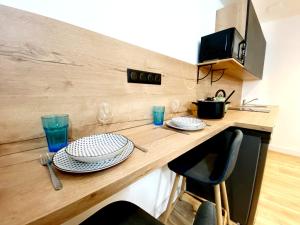 Appartements Le Bras d'or Apparts et Spa : photos des chambres