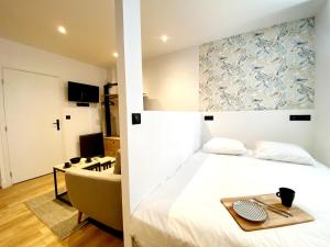 Appart'hotels Le Bras d'or Apparts et Spa : photos des chambres