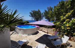 Emmas Villa fronte mare con piscina - Apulia Home