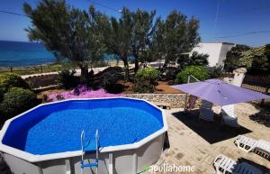 Emmas Villa fronte mare con piscina - Apulia Home