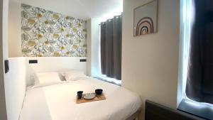 Appart'hotels Le Bras d'or Apparts et Spa : photos des chambres