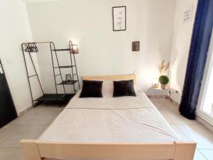 Appartements Appartement calme avec jardin privatif - 3 - : photos des chambres