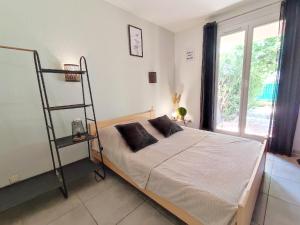 Appartements Appartement calme avec jardin privatif - 3 - : photos des chambres