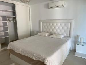 Half of the luxury villa with sea view and pool in natural park