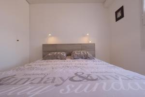 Un appartement sur la marina de St-Gilles