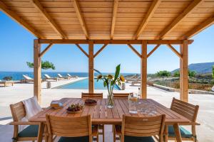 Villa Rodanthi - Chromatic Sunsets by etouri