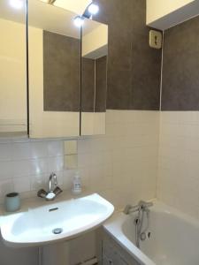 Appartements Appartement au coeur du village avec parking prive : photos des chambres