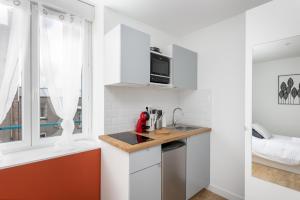 Appartements Louet - Beau studio tout equipe en plein centre : photos des chambres