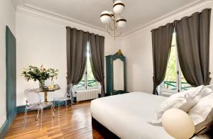 Chalets Villa - Chalet Clermont-Tonnerre avec piscine en centre-ville : photos des chambres