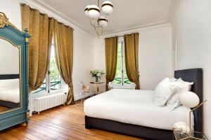 Chalets Villa - Chalet Clermont-Tonnerre avec piscine en centre-ville : photos des chambres
