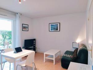 Appartements La Baignade de Montaigu, piscine et garage couvert : photos des chambres