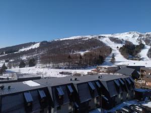 Appartements Un petit coin de paradis a Super Besse : photos des chambres