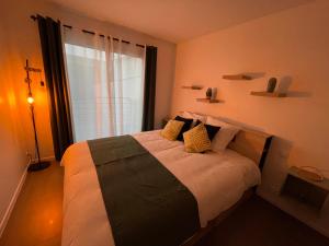 Appartements GOLD COCOON T3 74m2 proche centre ville : photos des chambres