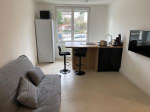 Appartements Le 33 : photos des chambres