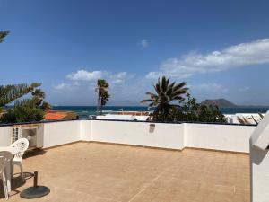 Beach house with the heated pool next to Rocky Point