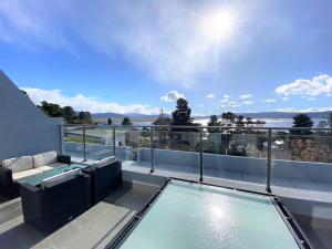 Summit 9 - Stylish 3BR Apartment l Amazing Lake Views l WiFi l BBQ l Air-Con