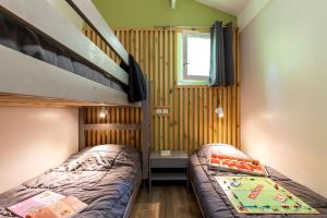 Villages vacances Village Nature et Ocean a cote de la plage avec piscine et jacuzzi : photos des chambres