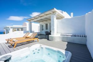 Pearl 2 Bedroom Sunset & Sea View Villa with Private Hot Tub & Shared Pool room in Oia Sunset Villas