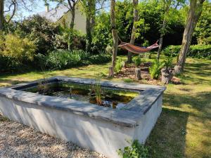 Maisons de vacances Au Jardin de la Marquetterie : photos des chambres