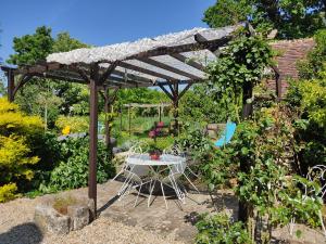 Maisons de vacances Au Jardin de la Marquetterie : photos des chambres