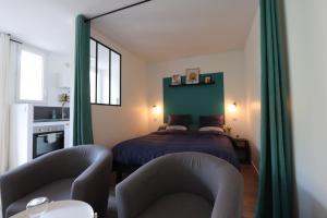 Appartements Studio tout confort - Climatisation, parking, wifi : photos des chambres