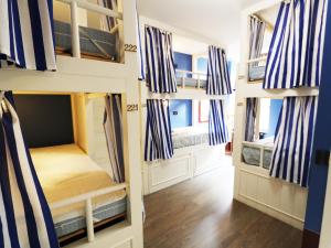 Bed in 8-Bed Mixed Dormitory Room room in Grand Hostel Coconut