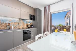 Two-Bedroom Apartment with Balcony and Sea View room in Apartments & Rooms Dario Krk