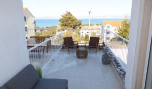 Appartamento Daisy con vista mare e piscina