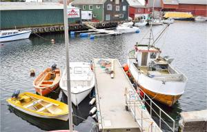 Amazing Apartment In Sævelandsvik With House Sea View