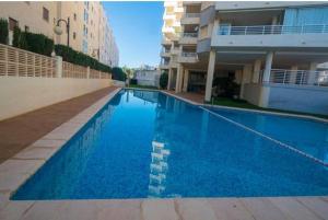 Apartamento Aquarium Park, 1ª linea de playa, piscina privada, aire acondicionado y wifi de alta velocidad