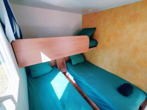 Campings Mobil-Home La Carpe - Camping Aurilandes : photos des chambres