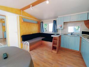 Campings Mobil-Home La Carpe - Camping Aurilandes : photos des chambres