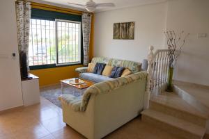 Beautiful Townhouse with views over the communal pool close to Campoamor Golf Course
