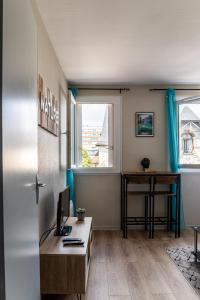 Appartements Le Debussy - studio - WIFI FIBRE- centre ville- parking : photos des chambres