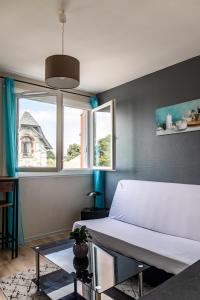 Appartements Le Debussy - studio - WIFI FIBRE- centre ville- parking : photos des chambres