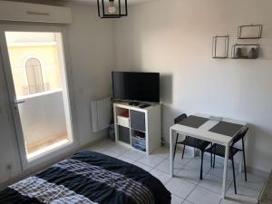 Appartements Le Studio 18 a Nimes, proche centre ville & Gare TGV, Wifi Balcon : photos des chambres