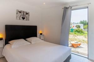 Appartements Tramontana au calme a 7 min des plages piscine partagee chauffee bbq : photos des chambres