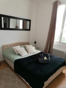 Appartements Charmant F2 : photos des chambres