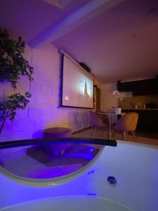 Capsule color deluxe Balnéo I écran home cinéma I console de jeux