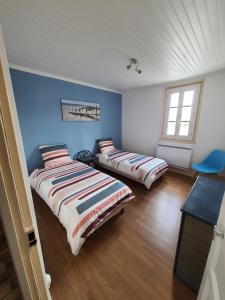 Appartements Duplex cosy a quelques minutes a pied de la mer. : photos des chambres