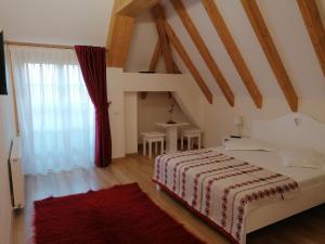 Pensiunea Căsuța din Deal