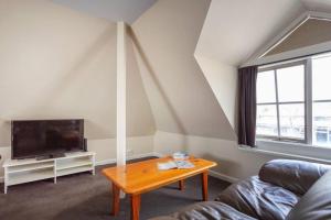 Upstairs Studio Apartment with street access