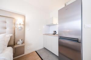 Hotels Quality Suites Maisons-Laffitte Paris Ouest : Appartement 2 Chambres avec 1 Lit Double et 2 Lits Simples