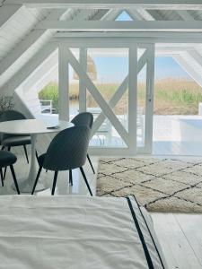 Seehütte Neusiedlersee - Strandhaus, Elektroboot inklusive