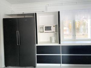 Maalaistalo maatilamiljöössä