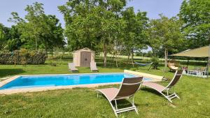 Maisons de vacances Charmant gite piscine privee chauffee climatise aux portes du Perigord entre Villereal et Monpazier : photos des chambres